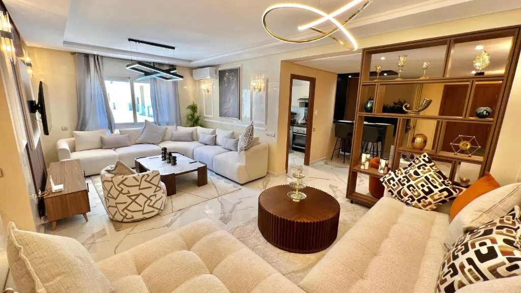 Salon d'appartement géré par une conciergerie Airbnb à Marrakech